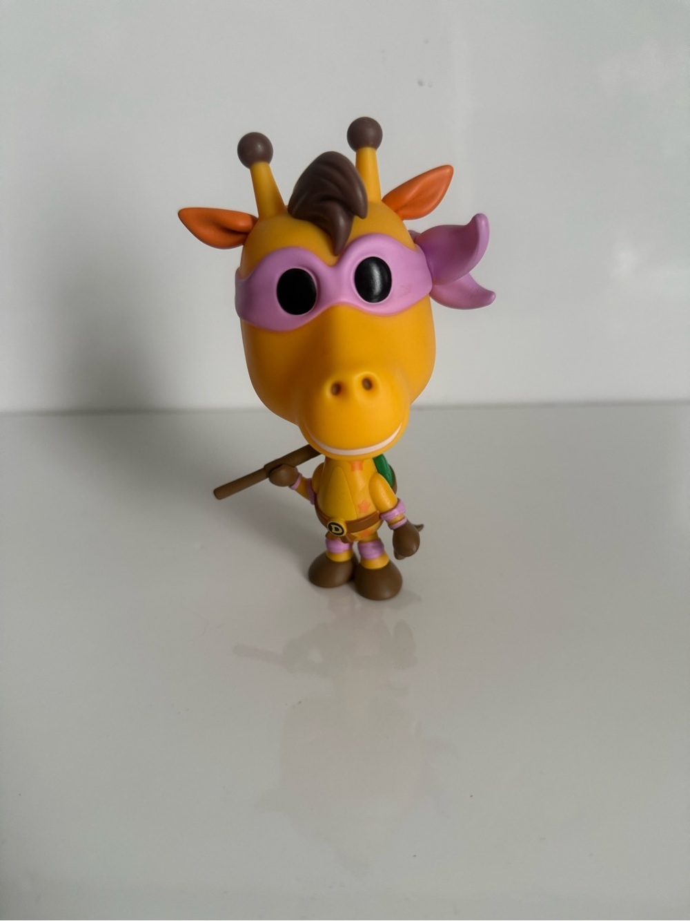 Funko pop Geoffrey the giraffe as Donatello no box but great condition